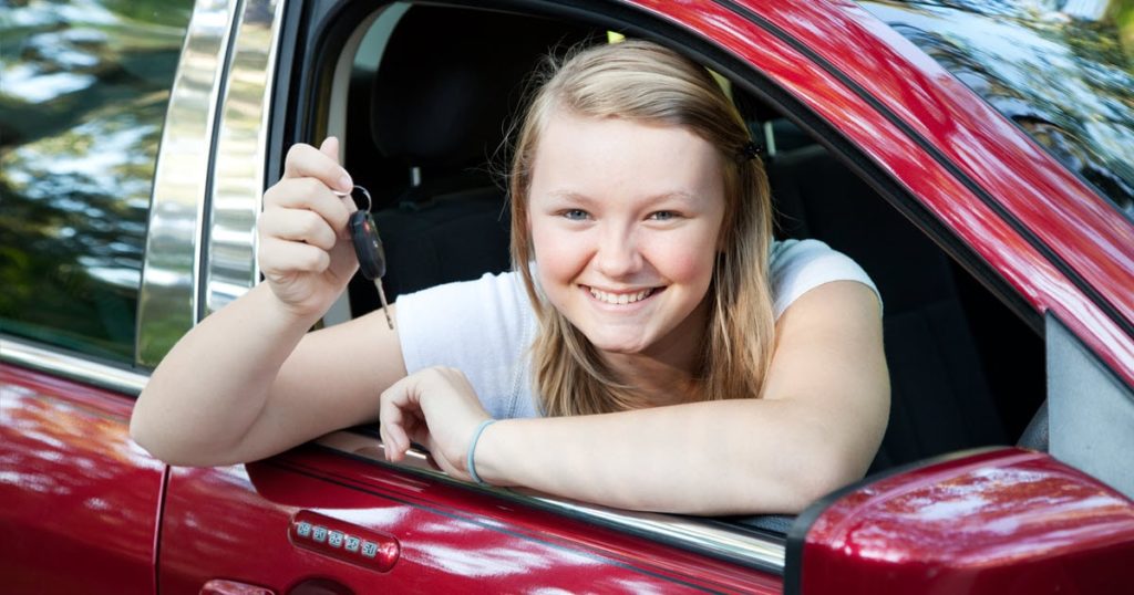 Teenage girl in car after passing P Plates provisional licence test.