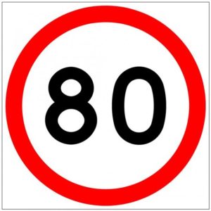 Speed limit sign showing 80km per hour speed limit.