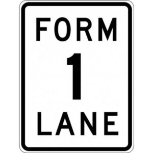 Form 1 lane traffic road sign.