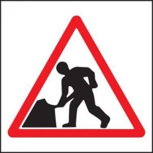 Warning sign to highlight men at work.