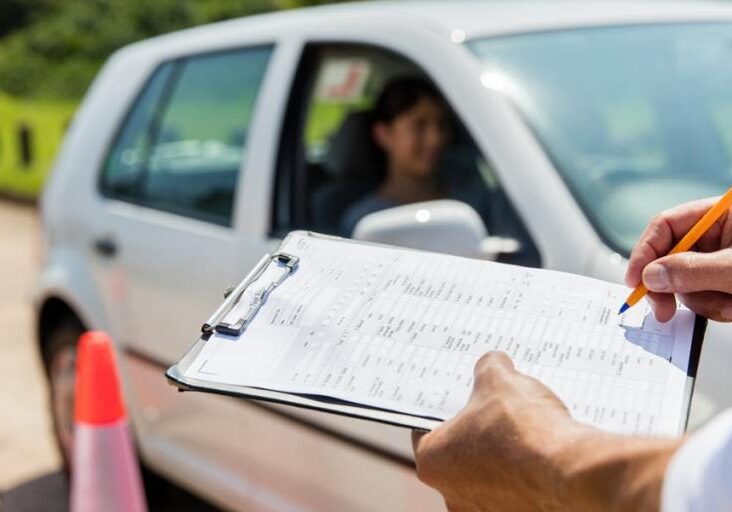 10 driving test tips - driving instructor assessing