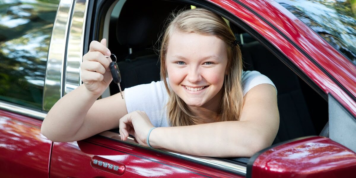 Teenage girl in car after passing P Plates provisional licence test.